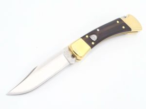 Buck Knives - 0110BRSA-B , Buck 110 Automatic  Lockback Knife , 3.75'' Clip Point Blade , Brass Bolsters , W / Leather Sheath